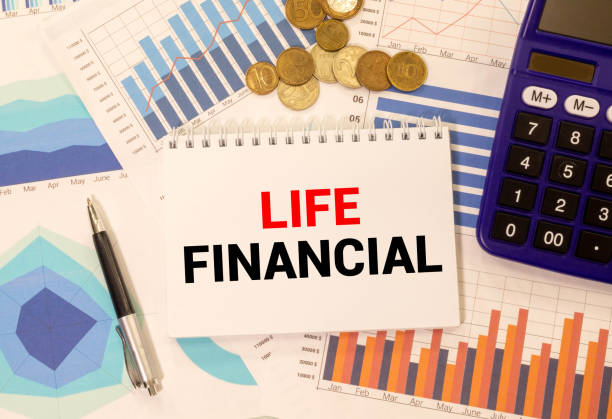 istock paper with text LIFE FINANCIAL on the shirt 1421766507