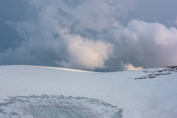 Free Stock Photo of Snow Covered Mountain Range Under Cloudy Blue Sky ...