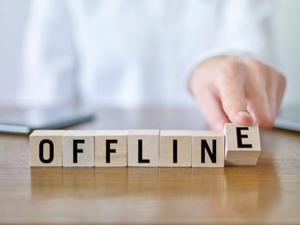 Offline Businesswoman forming ‘Offline’ text with cubic blocks offline stock pictures, royalty-free photos & images