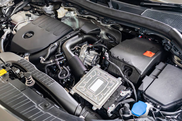 istock modern car engine under hood close up detail 1421772118