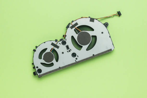 istock Powerful laptop cooler on a green background. 1421777377