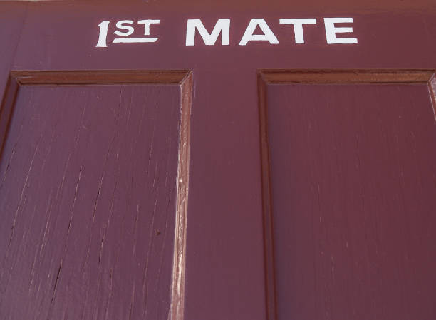 istock Purple door with sign in white reading 1st Mate 1421780579