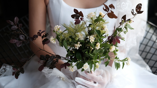 Bride holding her flower bouquet