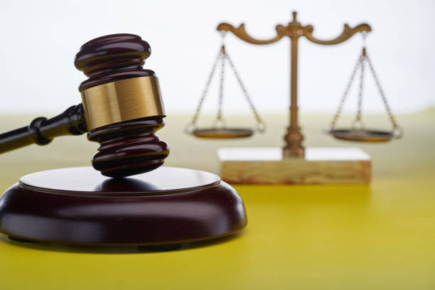close up of the gavel hammer and  libra scale