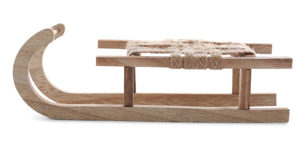 istock Beautiful decorative wooden sleigh on white background 1421797298