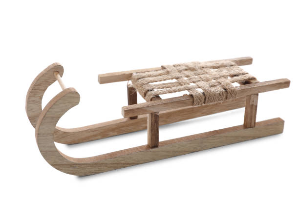 istock Beautiful decorative wooden sleigh on white background 1421797877