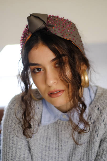 istock Young woman portrait in a sweater 1421800496