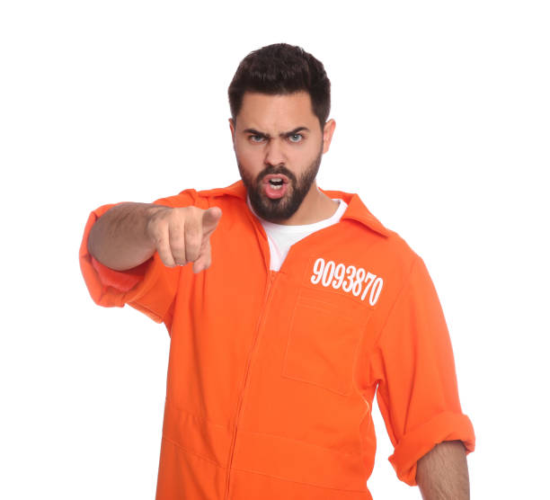 istock Emotional prisoner in jumpsuit on white background 1421800847