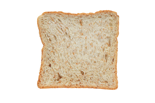Whole wheat sandwich bread slices isolated on white background with clipping path.
