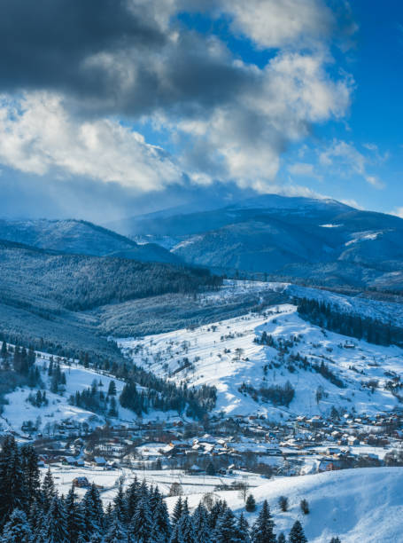 istock Panorama of Carpathian valley covered by snow 1421804600