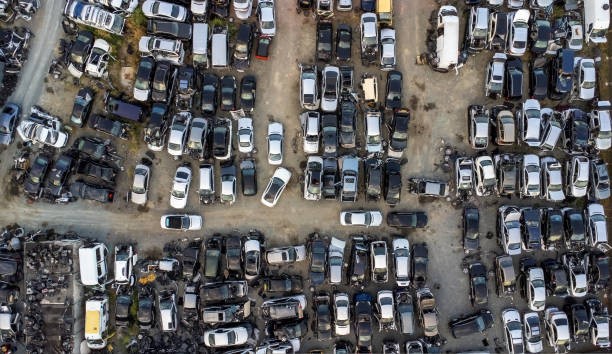 istock Junkyard with discarded broken cars 1421806566