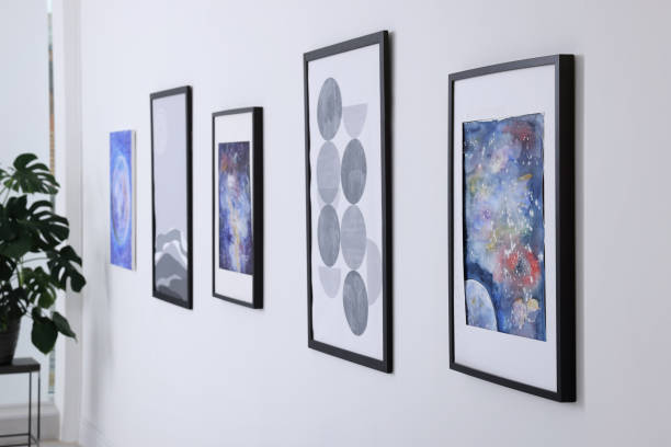 Beautiful paintings on wall in modern art gallery