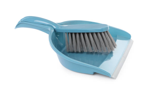 istock Plastic hand broom and dustpan isolated on white 1421817303
