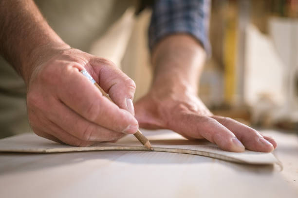 istock Mature man taking perfect measurement 1421818946