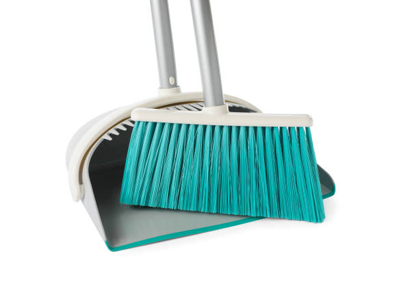 istock Plastic broom and dustpan on white background 1421823360