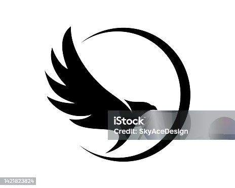 istock Circle with eagle silhouette inside 1421823824