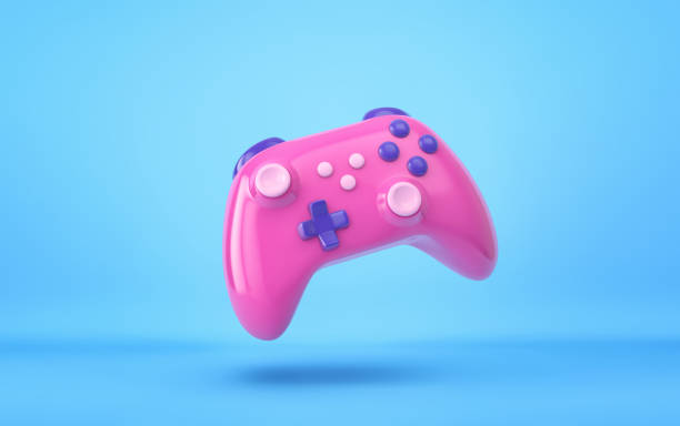 istock Pink glossy game controller on blue background. Clipping path included 1421838271