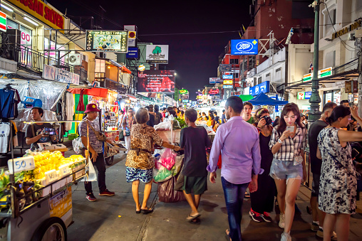 Bangkok, Thailand - September 9, 2019: Khao San Road in Bangkok at night: You see many tourists walking around, having fun and enjoying their vacation