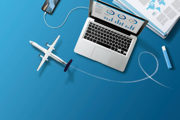 istock Planning a Business trip by Plane on the Laptop 1421842900