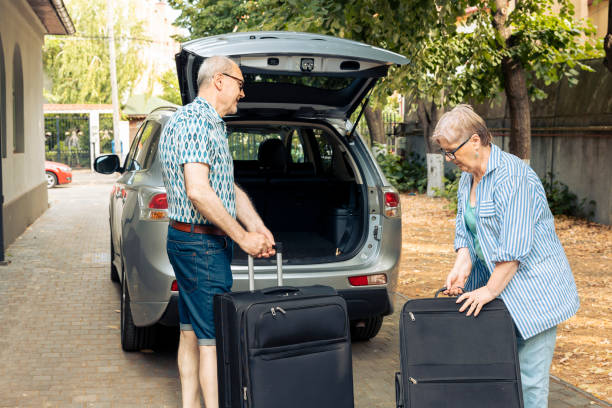 istock Elderly husband and wife going on holiday vacation 1421843751