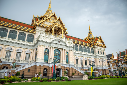 Bangkok, Thailand - September 9, 2019: tourists in front of Chakri Maha Prasat Throne Hall, Royal Palace in Bangkok