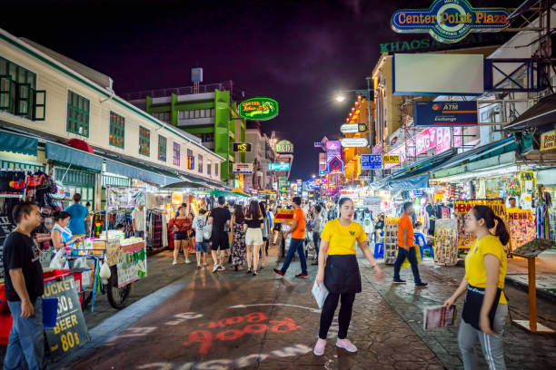 Khao San Road in Bangkok Bangkok, Thailand - September 9, 2019: Tourists at Khao San Road night market. Khao San Road is a famous low budget hotels and guesthouses area in Bangkok. khao san road stock pictures, royalty-free photos & images