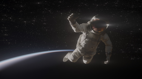 Astronaut in spacesuit showing thumbs up, cosmonaut floating in space, close up view, 3D rendering