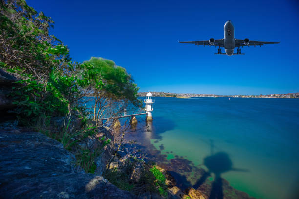 istock Plane flying over Sydney Harbour Sydney NSW Australia. 1421851390