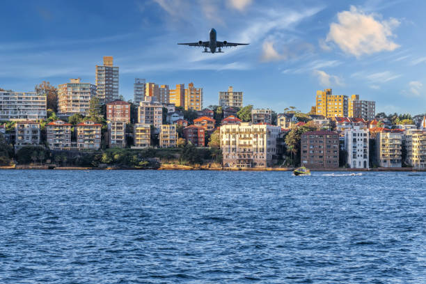istock Plane flying over Sydney Harbour Sydney NSW Australia. 1421851849