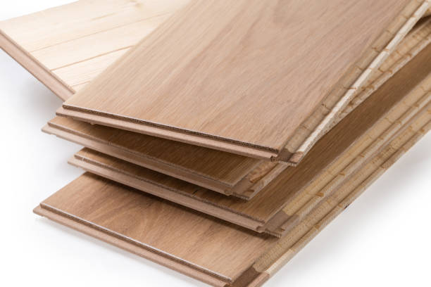 istock Oak engineered wood flooring boards in stack, fragment close-up 1421853566