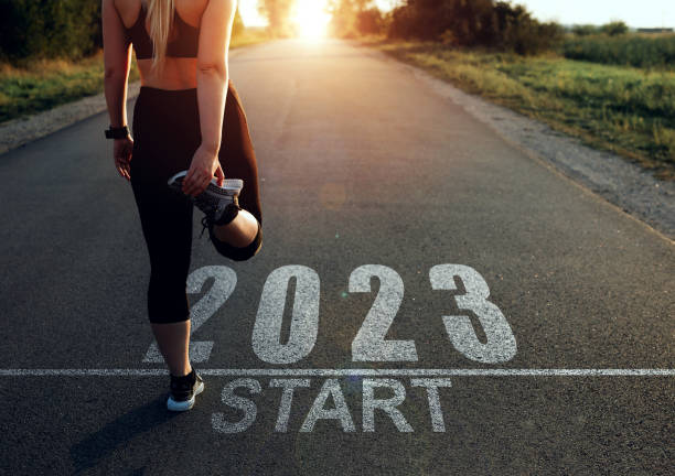 Sports girl who wants to start the year 2023. Concept of new professional achievements in the new year and success. New Year 2023 with new ambitions, challenge, plans, goals and visions. stock photo