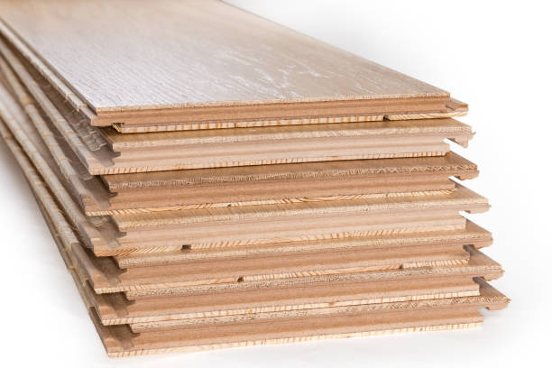 istock Oak engineered wood flooring boards stack, fragment of end parts 1421853850