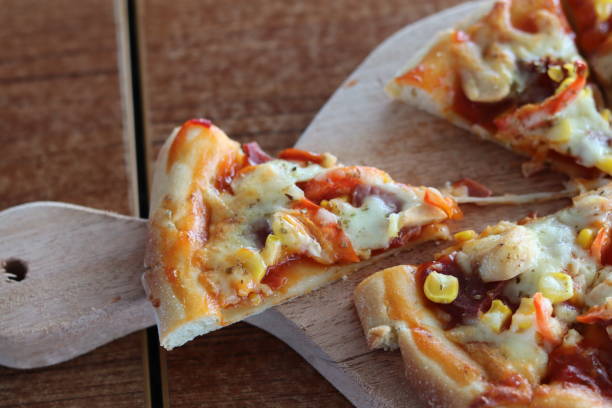 istock large slice of pizza served as a snack 1421861157