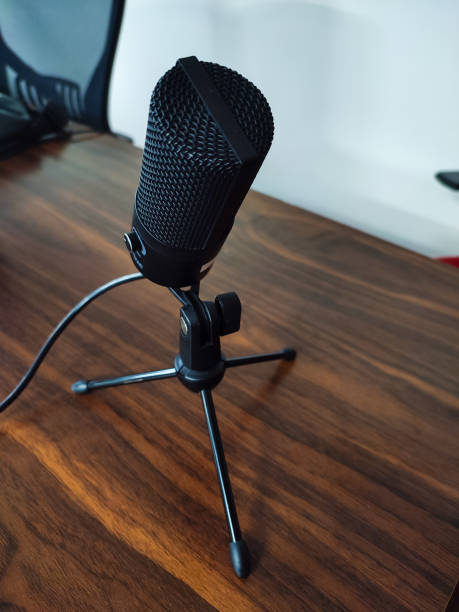 istock Microphone on top of meeting table 1421861484