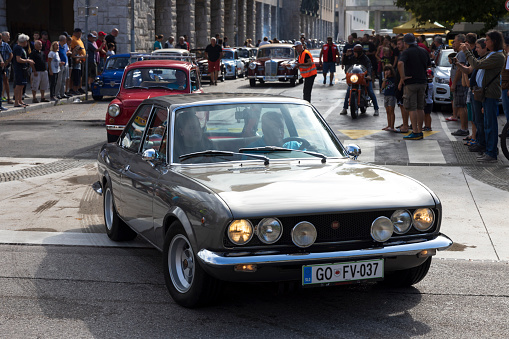 Nova Gorica, Slovenia - 28. August 2022: Old Vintage Car and Motorcycle Reunion Show in Town Center, Here a Fiat 124 in great conditions.