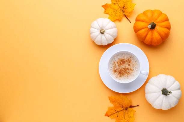istock Cup of coffee and pumpkins 1421863853