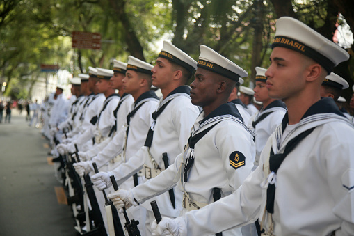 Naval cap with a visor on white background