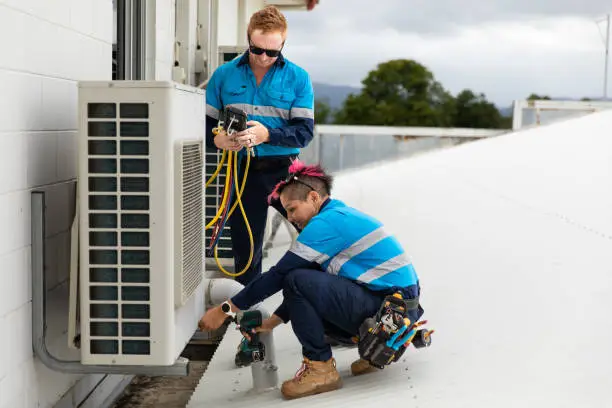 Photo of Day in the life of a female  tradie and her co-worker