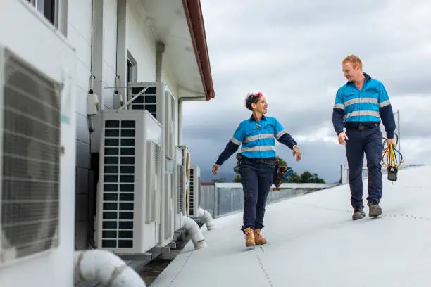 Photo of Day in the life of a female  tradie and her co-worker