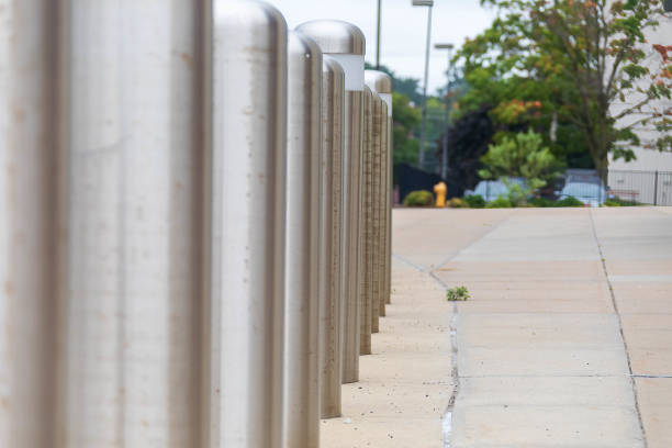 istock row of traffic barriers protecting a sidewalk and building 1421882143