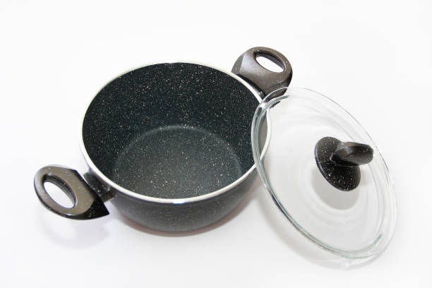 istock grey metal pan with teflon coating and glass lid on a white background 1421882249