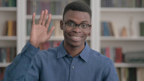 istock Young African Man Talking on Online Video Call 1421885415