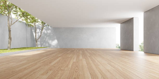 istock 3d rendering of empty room with wooden floor and concrete wall. 1421886352