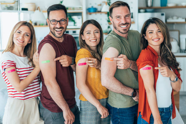 istock Friends showing their arms after getting vaccinated 1421886896