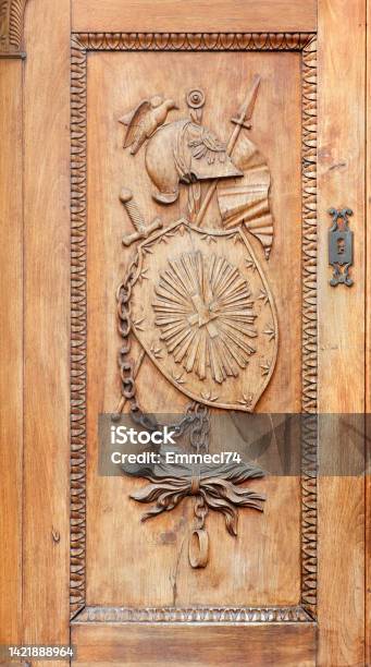 Decoration On The Wooden Door At The Entrance Of The Sacra Di San Michele Stock Photo - Download Image Now