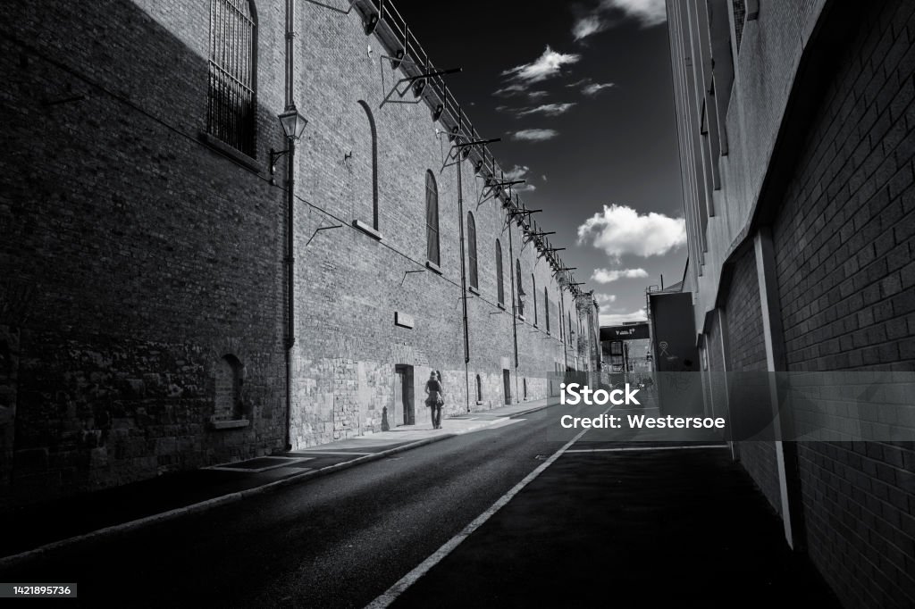 Brick build storehouse. Public street near Guinness head office housing the brewery Adult Stock Photo
