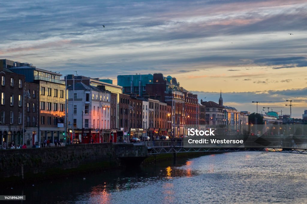 Dusk in Dublin Getting dark along river Liffey close to new finance district "the Docklands" Dublin - Republic of Ireland Stock Photo