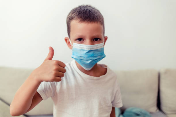 istock Portrait of a boy wearing a face mask. 1421896551