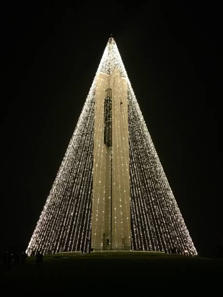 Bell tower lit up for the holidays. stock photo