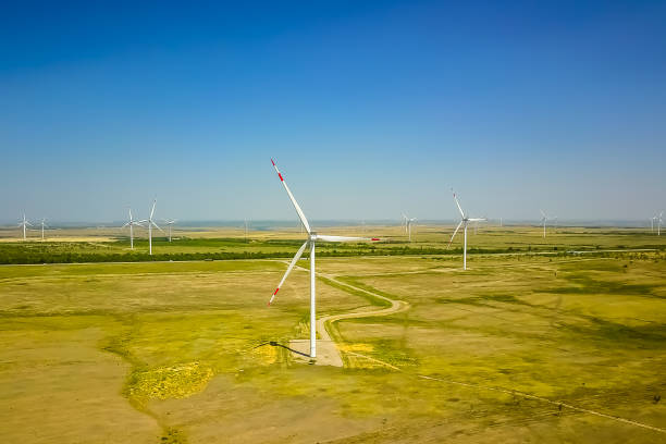istock Renewable green energy, wind energy with windmills or wind turbine 1421905018